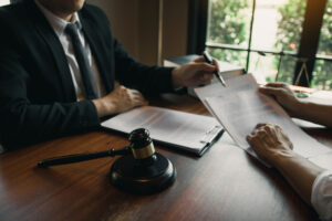 Man judge is currently advising clients on their requests for legal proceedings and legal advice.